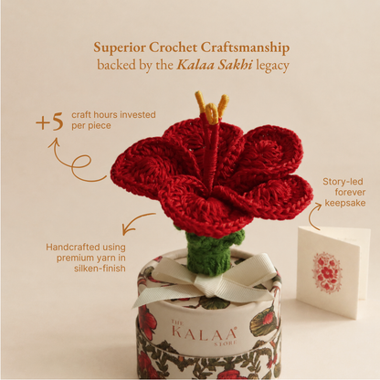 Close-up of the hibiscus crochet flower showing its handmade yarn petals and texture